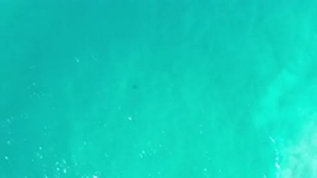 LOS CABOS MEXICO-2020: Turquoise Green Crystal Clear Water Gently Flowing On A