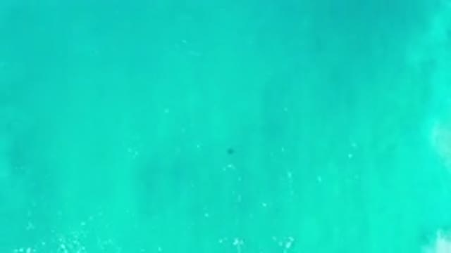 LOS CABOS MEXICO-2020: Aerial View Of The Ocean With Its Green Waters And Some Waves