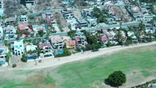 LOS CABOS MEXICO-2020: Top View Of Beautiful Buildings And Green Fields Nearby