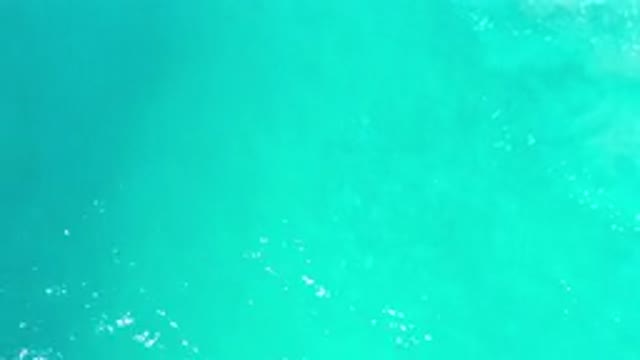 LOS CABOS MEXICO-2020: Clear Turquoise Ocean Water Flowing On The Screen On A