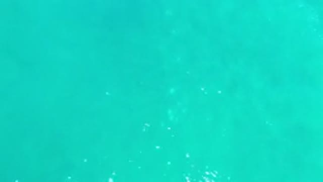 LOS CABOS MEXICO-2020: Light Reflecting Off Of Calm Clear Blue Water