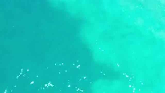 LOS CABOS MEXICO-2020: Beautiful Crystal Clear Turquoise Ocean Water Rippling In