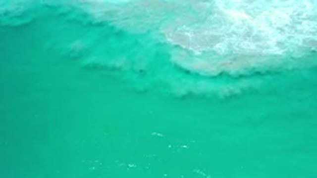 LOS CABOS MEXICO-2020: Teal Ocean With Gray Unhealthy Waves In View Churning