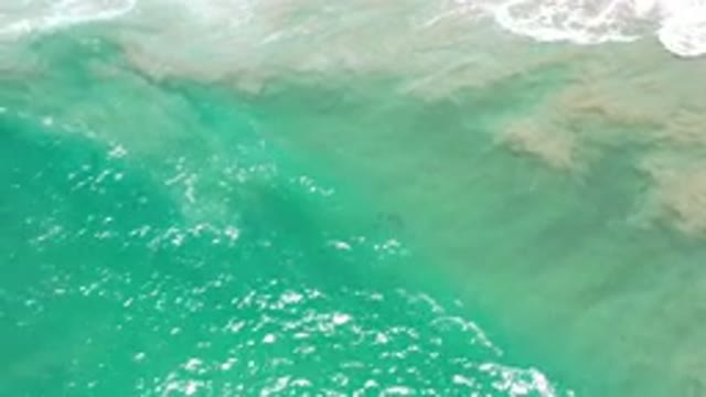 LOS CABOS MEXICO-2020: Sparkling Turquoise Green Ocean Waters Crashing On A