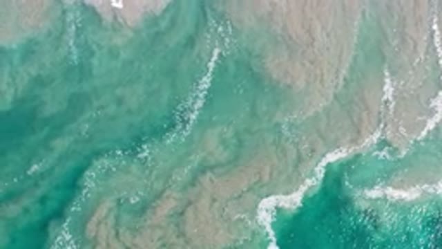 LOS CABOS MEXICO-2020: Slow Motion Capture Of Green Ocean Wave Breaking In