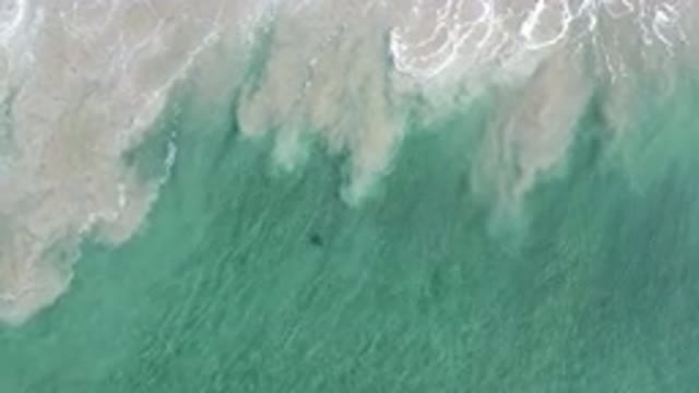 LOS CABOS MEXICO-2020: Water Meets The Sand As The Current Moves Them Together