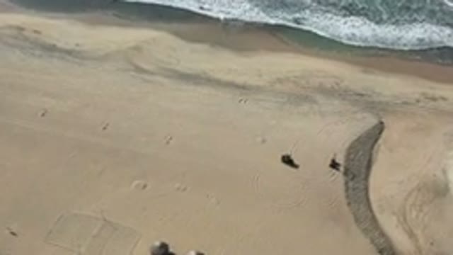 LOS CABOS MEXICO-2020: Two People Walking on a Beach in Slow Motion