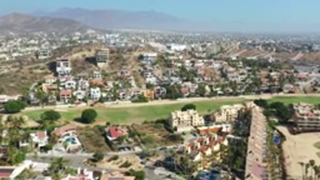 LOS CABOS MEXICO-2020: In a Long View Buildings and Trees Are Shown