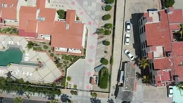 LOS CABOS MEXICO-2020: Drone Flying Above City With Roads And Cars