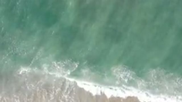 LOS CABOS MEXICO-2020: Serene Birds-Eye View Of A White-Crested Wave Washing