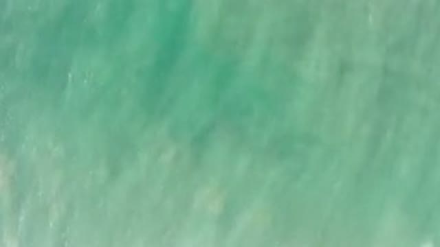 LOS CABOS MEXICO-2020: Blue Green Water Undulating With Sands That Can Be Seen