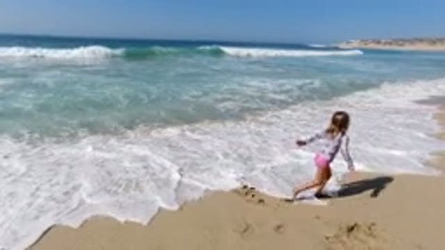 LOS CABOS MEXICO-2020: Little Girl Feels Happy While On The Seashore