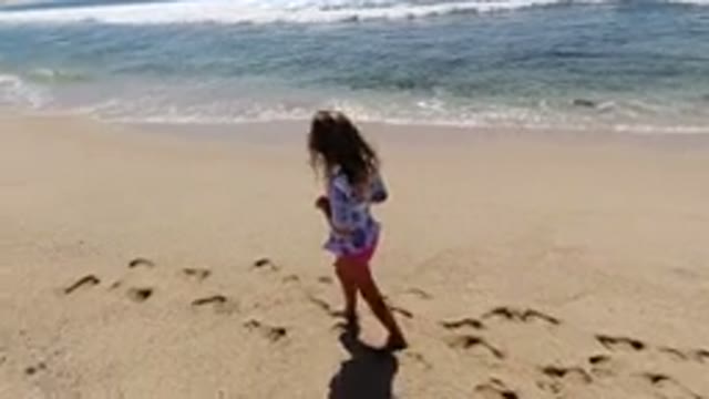 LOS CABOS MEXICO-2020: Lonely Little Girl Walks The Beach