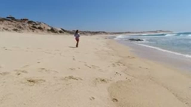 LOS CABOS MEXICO-2020: Little Girl Falls Playing At The Beach