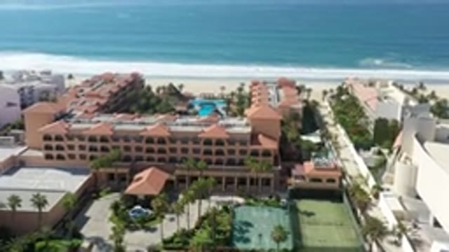LOS CABOS MEXICO-2020: Drone Footage Of Fancy Resort On Ocean Beach With Blue