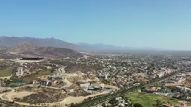 LOS CABOS MEXICO-2020: Aerial View Of Green Plains And Many Houses On A Clear
