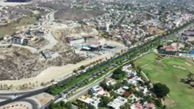 LOS CABOS MEXICO-2020: Between Mountains And Trees Cars Travel Fast While People