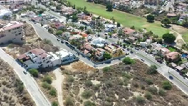 LOS CABOS MEXICO-2020: A Car Line Road Along Building Front Property In A City