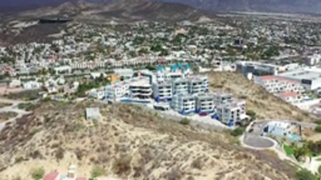 LOS CABOS MEXICO-2020: Aerial View of Modern Buildings and Open Land on a Sunny Day