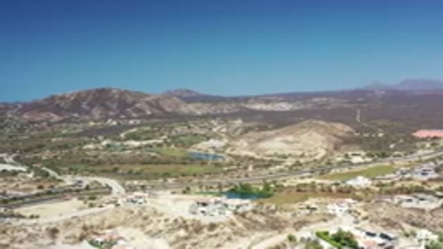LOS CABOS MEXICO-2020: Footage Of A Road Between Hills And Mountains With Clear Sky