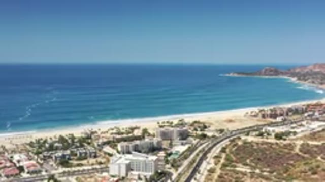 LOS CABOS MEXICO-2020: Seafront With Buildings Near The Beach On A Sunny Day And