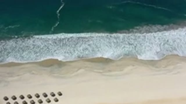 LOS CABOS MEXICO-2020: The White Line Starting From The Sand Divides The Blue