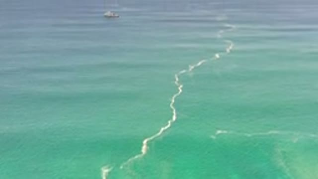 LOS CABOS MEXICO-2020: Panning Upward On A Gradient Blue Green Ocean And The