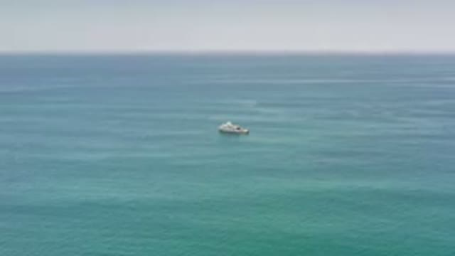 LOS CABOS MEXICO-2020: A Boat Is Seen From Afar In The Middle Of The Ocean
