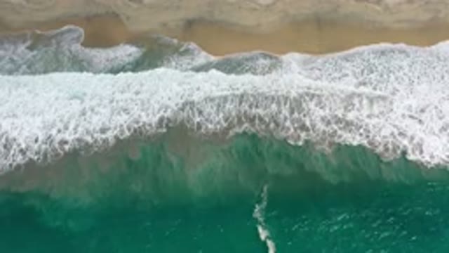 LOS CABOS MEXICO-2020: Waves Of An Incredible Blue And Agitated Sea Reaching The Beach