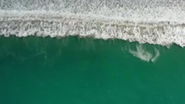 LOS CABOS MEXICO-2020: Aerial View Of Waves Crashing On A Beach