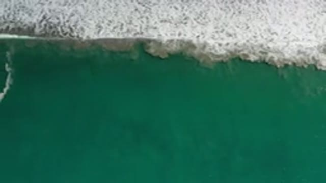 LOS CABOS MEXICO-2020: White Foamy Waves Break On The Sea Shore And Water
