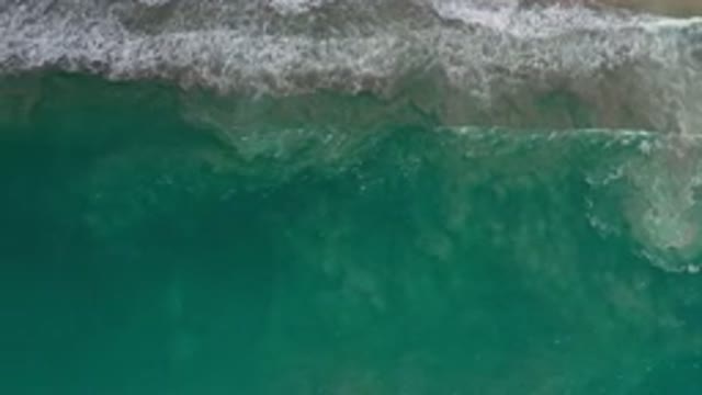LOS CABOS MEXICO-2020: Green Water Waves with White Foam