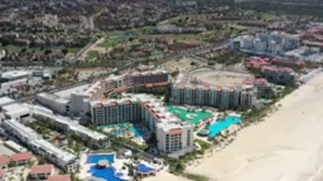 LOS CABOS MEXICO-2020: Footage Of A City With Buildings And Swimming Pools Next