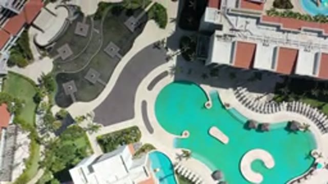 LOS CABOS MEXICO-2020: Aerial View Of Pool And Buildings With White And Red