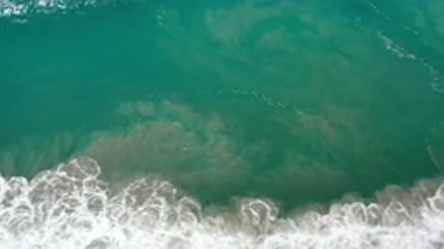LOS CABOS MEXICO-2020: Slow Motion Breaking Cyan Wave Generating A Lot Of Air