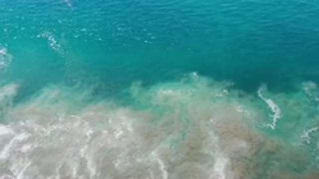 LOS CABOS MEXICO-2020: Blue Clear Water Crashing Waves on Shore Sand Beach Sun