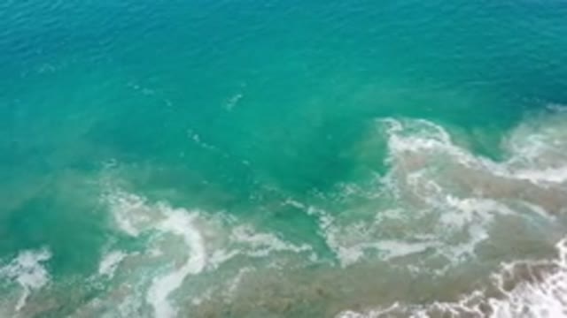 LOS CABOS MEXICO-2020: The Green Of The Sea Turning Gray With The Waves Coming