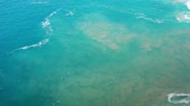 LOS CABOS MEXICO-2020: Massive Green Sea and Blue Sky with Clouds