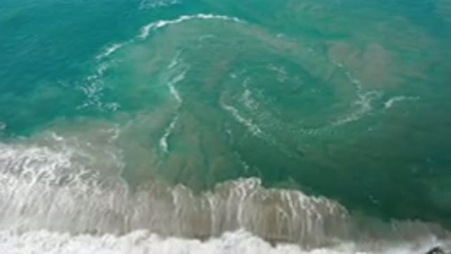 LOS CABOS MEXICO-2020: Beautiful Aqua Blue Waves Crash Into The Shore