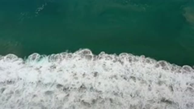 LOS CABOS MEXICO-2020: Aerial View Of Waters That Are Divided Into White Waves