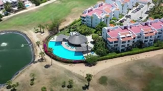 LOS CABOS MEXICO-2020: City With Houses Trees And A Swimming Pool In The Late Afternoon