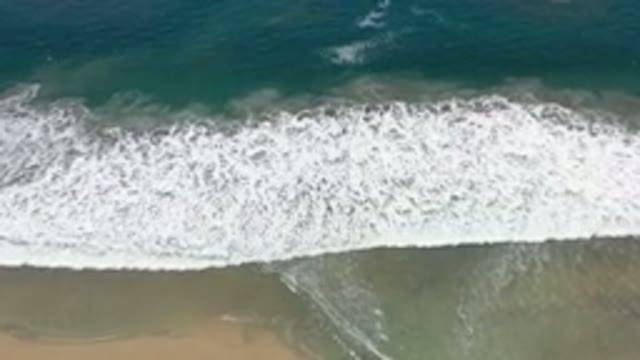 LOS CABOS MEXICO-2020: Overhead View Of The Peaceful Waves Crashing On Beautiful