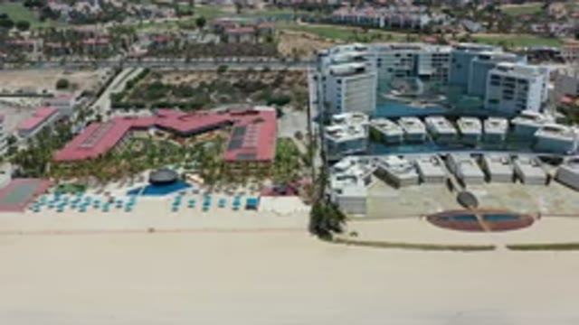 LOS CABOS MEXICO-2020: Aerial View Of Sand On Beach With Buildings And Streets