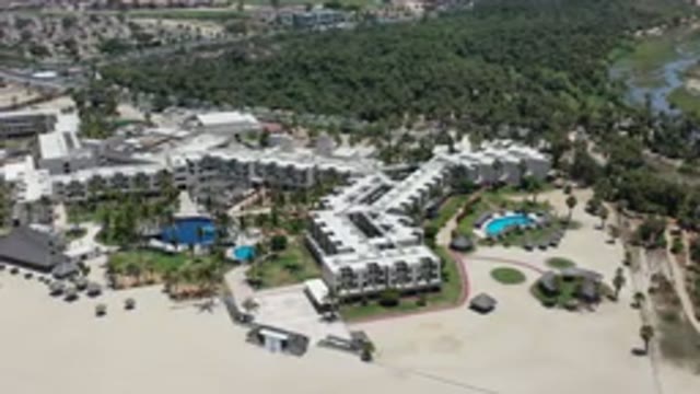 LOS CABOS MEXICO-2020: Huge Buildings Near A Sand Beach And Lot Of Green