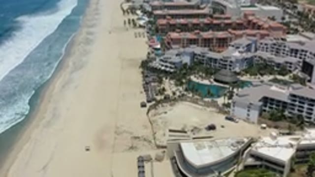 LOS CABOS MEXICO-2020: Aerial View Of Sandy Beach And Rooftops