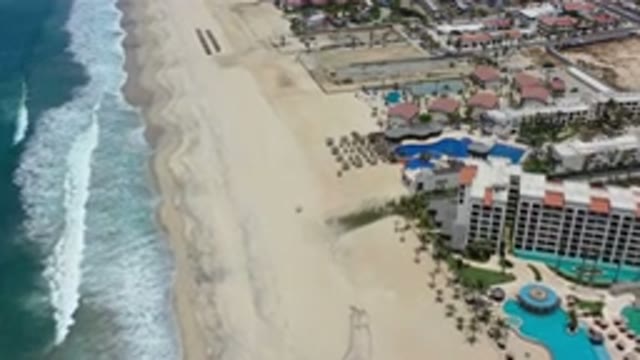 LOS CABOS MEXICO-2020: Waves Hitting Beach Along Shoreline