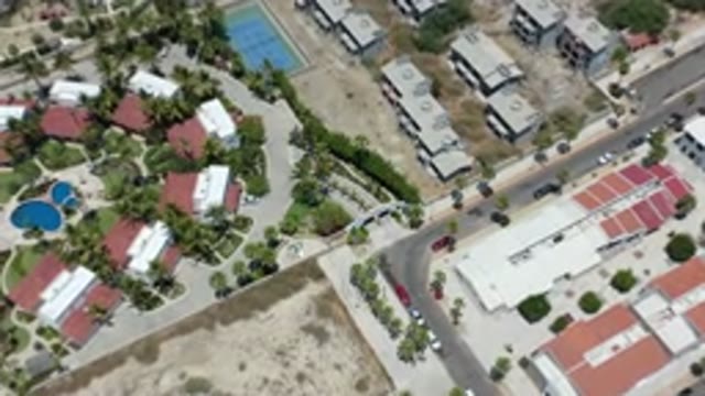 LOS CABOS MEXICO-2020: Aerial View Of Buildings On Beachfront Property With Sand