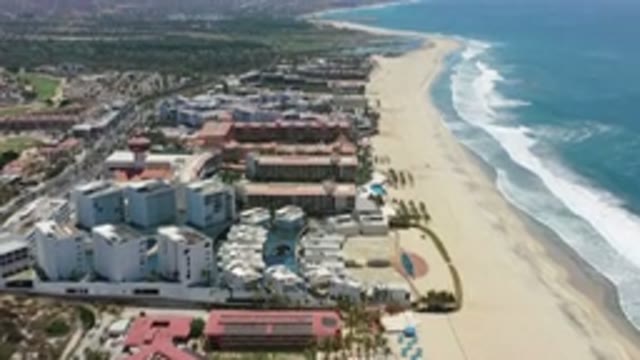 LOS CABOS MEXICO-2020: Flying Over A Beach Side Resort Right Next To The Ocean