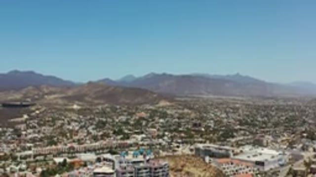 LOS CABOS MEXICO-2020: Scenic View of Buildings and Trees Along Coastal Landscape