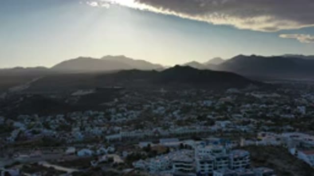 LOS CABOS MEXICO-2020: Footage Of A City In A Mountain With Clouds In The Sky